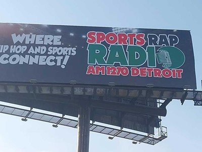 A billboard advertises Detroit’s Sports Rap Radio.