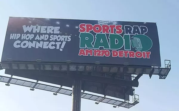 A billboard advertises Detroit’s new Sports Rap Radio.