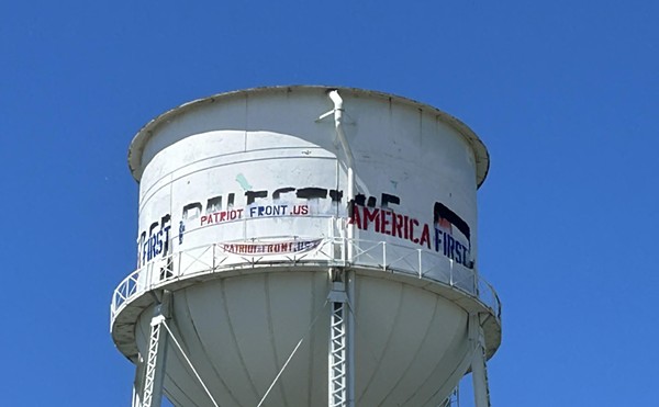 Racist messages were scrawled on Highland Park's water tower.