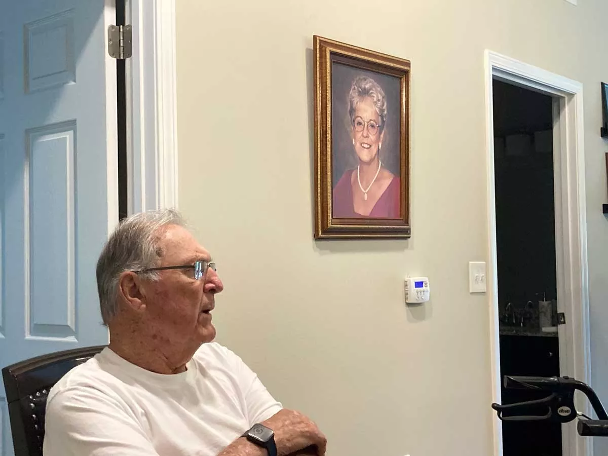 Image: Gene Kelty with a picture of his wife Peggy, who died last year after 64 years of marriage.