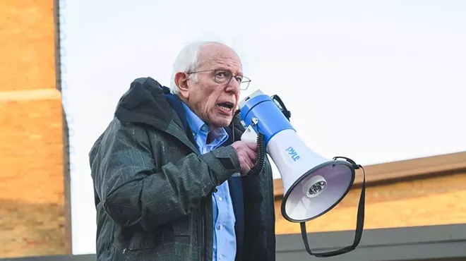 Sen. Bernie Sanders addresses supporters outside Lincoln High School in Warren.