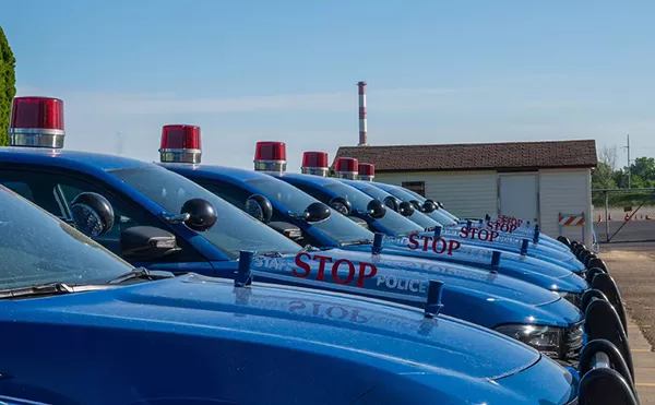 A fleet of Michigan State Police vehicles.