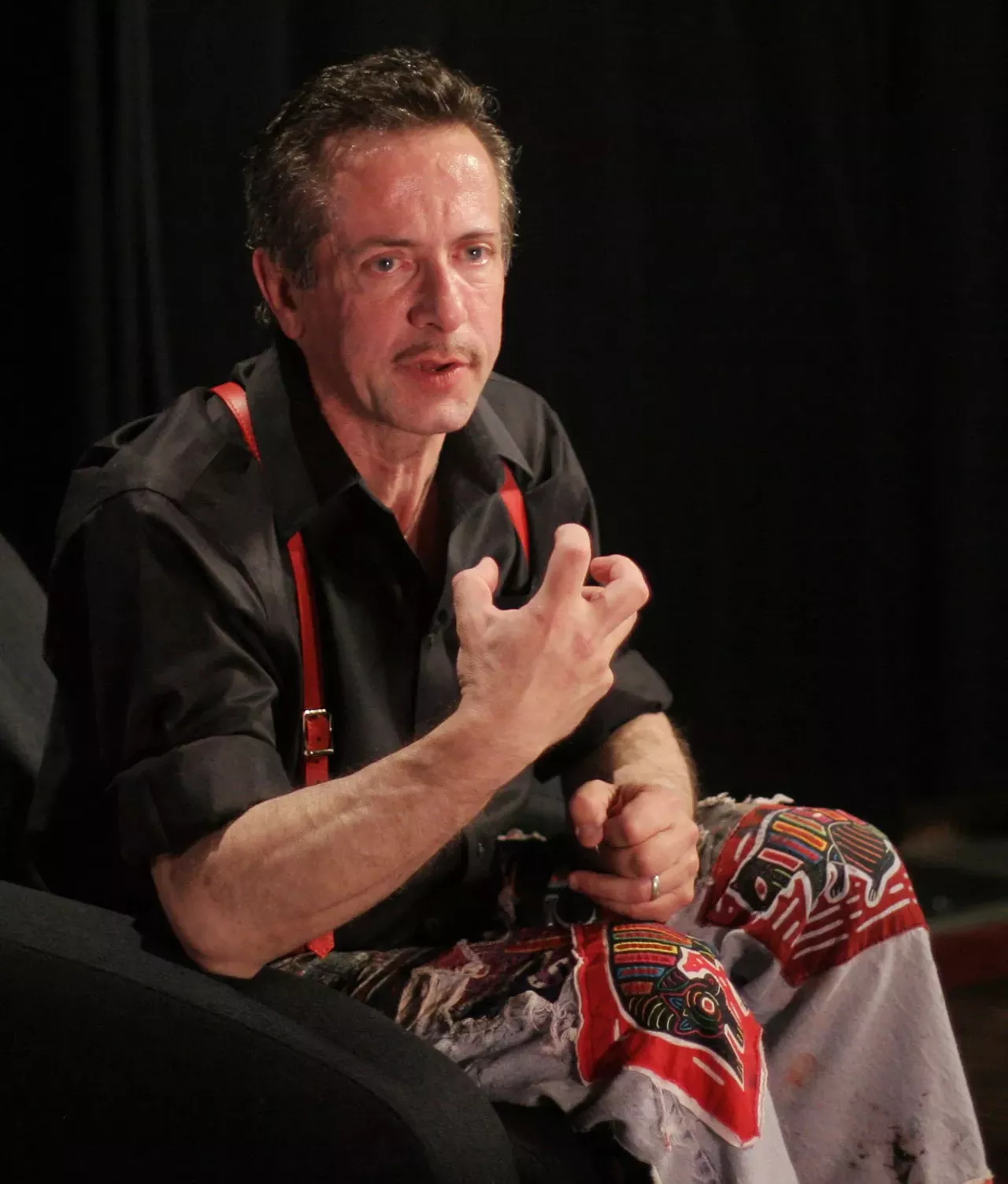 Clive Barker, 2009 We approached author and director Barker about his paintings, and he let us know he was now concentrating on photography. He emailed pictures and they were all nude men, colorful, and harder (pun intended) than the typical black-and-white homoerotica trailblazed by Maplethorpe wannabes. The Dirty Show was the world premiere of these photos and our opportunity to showcase the work of our first openly gay special guest artist.