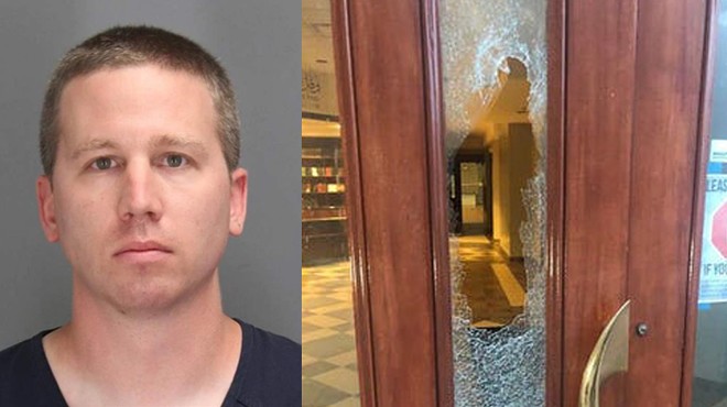 Ryan Lee Ahern, 33, of Rochester Hills, is accused of breaking glass in a door at the Ahmadiyya Muslim Community Center with a hammer.