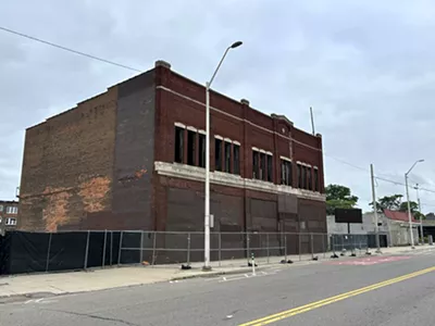 The old Chinatown building at 3143 Cass Ave. could soon be demolished if activists don’t get their way.