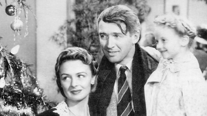 Jimmy Stewart, Donna Reed, and Karolyn Grimes in It's a Wonderful Life.