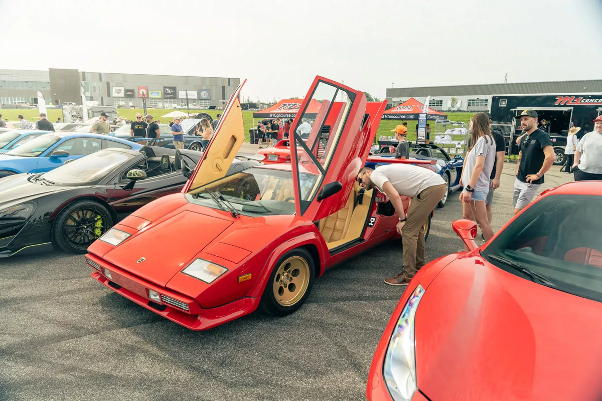 Image: Auto enthusiasts get up close and personal at Cars & Coffee.