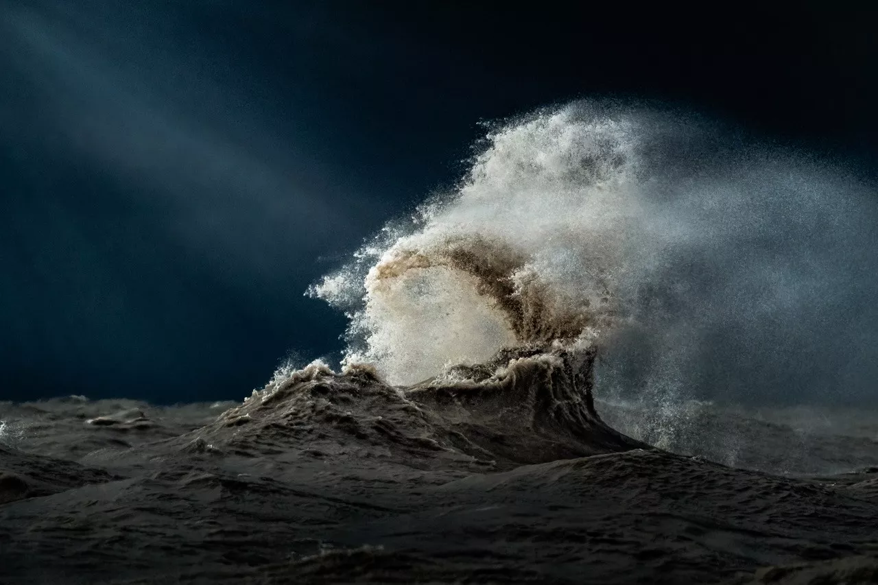 “Anywhere that has a barrier, be that man made or natural, could potentially be a prime spot to capture these waves. I like to shoot at Ports closer to home, such as Port Burwell, Port Bruce and Port Stanley. These three spots have man made piers that can deflect the water back out to the lake when the winds are at the proper angle.”