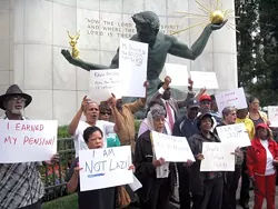 Protesters at the Coleman A. Young Municipal Building on Aug. 5 let EM Kevyn Orr know they were less than pleased with recent comments he made in the WSJ.