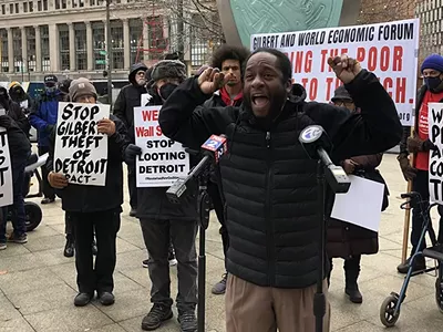 Image: Protesters rally against World Economic Forum in downtown Detroit