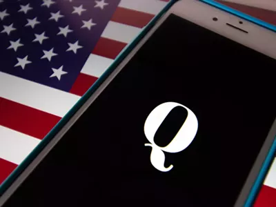 Image: QAnon adherent from Michigan charged with threatening to kill a congressman and FBI director