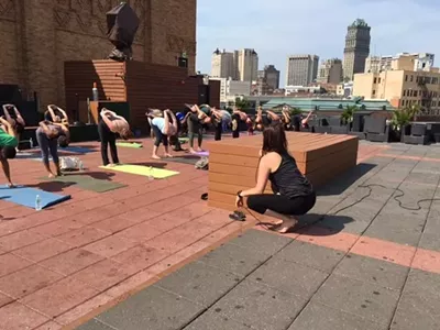 Image: Raise money for Detroit Music Hall while doing yoga on its roof tonight