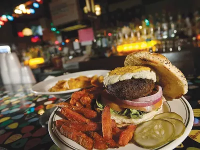 Black 'n Blue Burger with sweet potato fries and a side of mac 'n' cheese, from PJ's Lager House in Detroit.