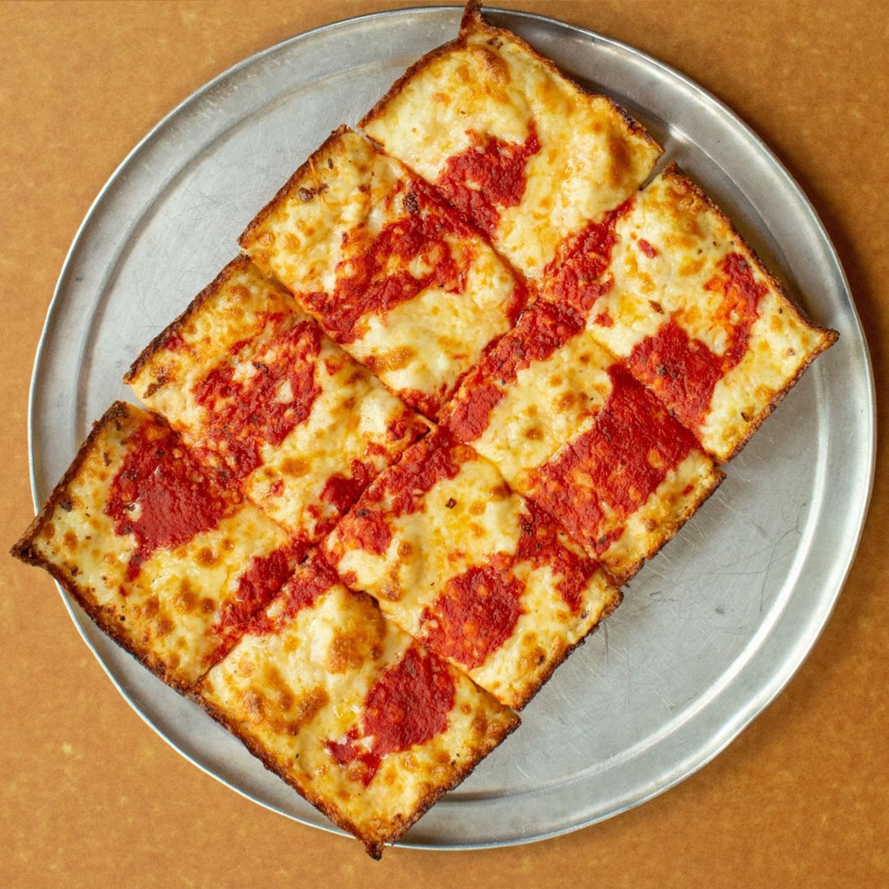 Detroit-style Pizza aka pizza 
It cannot be denied: Detroit-style pizza is having a moment &#151; and not just here on its home turf but across the globe, with folks copping our 70-plus-years-old Sicilian-inspired recipe. There are a few essential steps in a perfect Detroit-style pie: A rectangular pizza pan, Wisconsin brick cheddar, and the sauce, which does not hit the dough first, but last. Don&#146;t question it, just do it, bake it, and then eat it.  
Find the recipe here.
Photo via Buddy&#146;s Pizza/Facebook