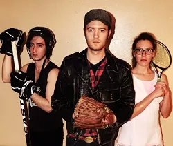 Ronny Tibbs and the 305’s: from left to right are George Morris, Jessica Wildman and Ronny Tibbs. About the getups: Tibbs said he would be an athlete if not for the asskickings. Photo by Roxy Shiflet.
