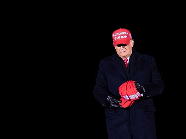 Then-President Donald Trump arrives for his final Make America Great Again rally at Gerald R. Ford International Airport Nov 3, 2020, in Grand Rapids.