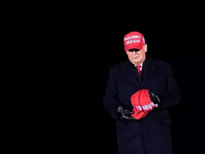 Then-President Donald Trump arrives for his final Make America Great Again rally at Gerald R. Ford International Airport Nov 3, 2020, in Grand Rapids.