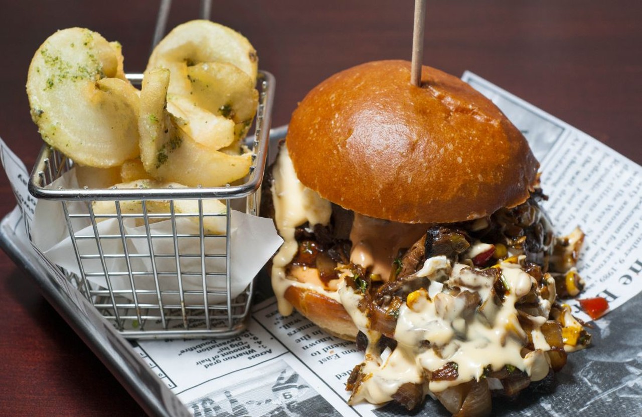 "The Royale With Cheese" with smoked brisket (Royale will smoke its brisket in house for at least 12 hours every day), southwest corn relish, caramelized onions, avocado, smoked gouda cheese fondue, creamy coleslaw, and a drizzle of Royale sauce.
