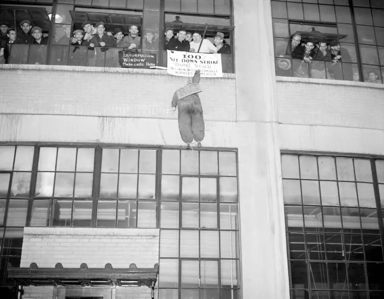  Dec. 31, 1936: Flint auto workers on strike at Flint Chevrolet Plant #2.