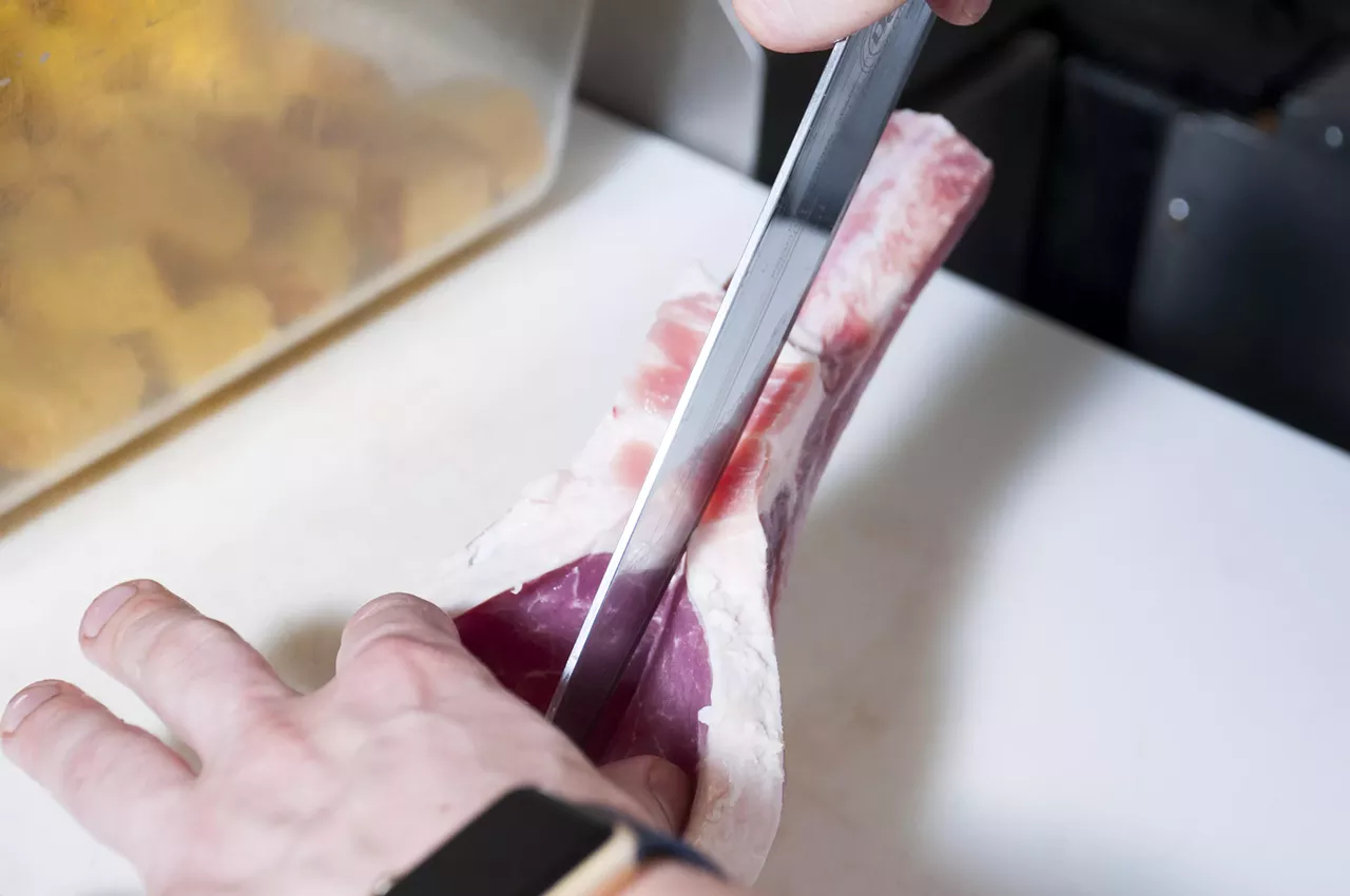 Slice the chop and pull it open.