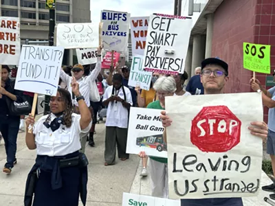 Public transit activists march in downtown Detroit, calling on elected officials to improve the bus systems.