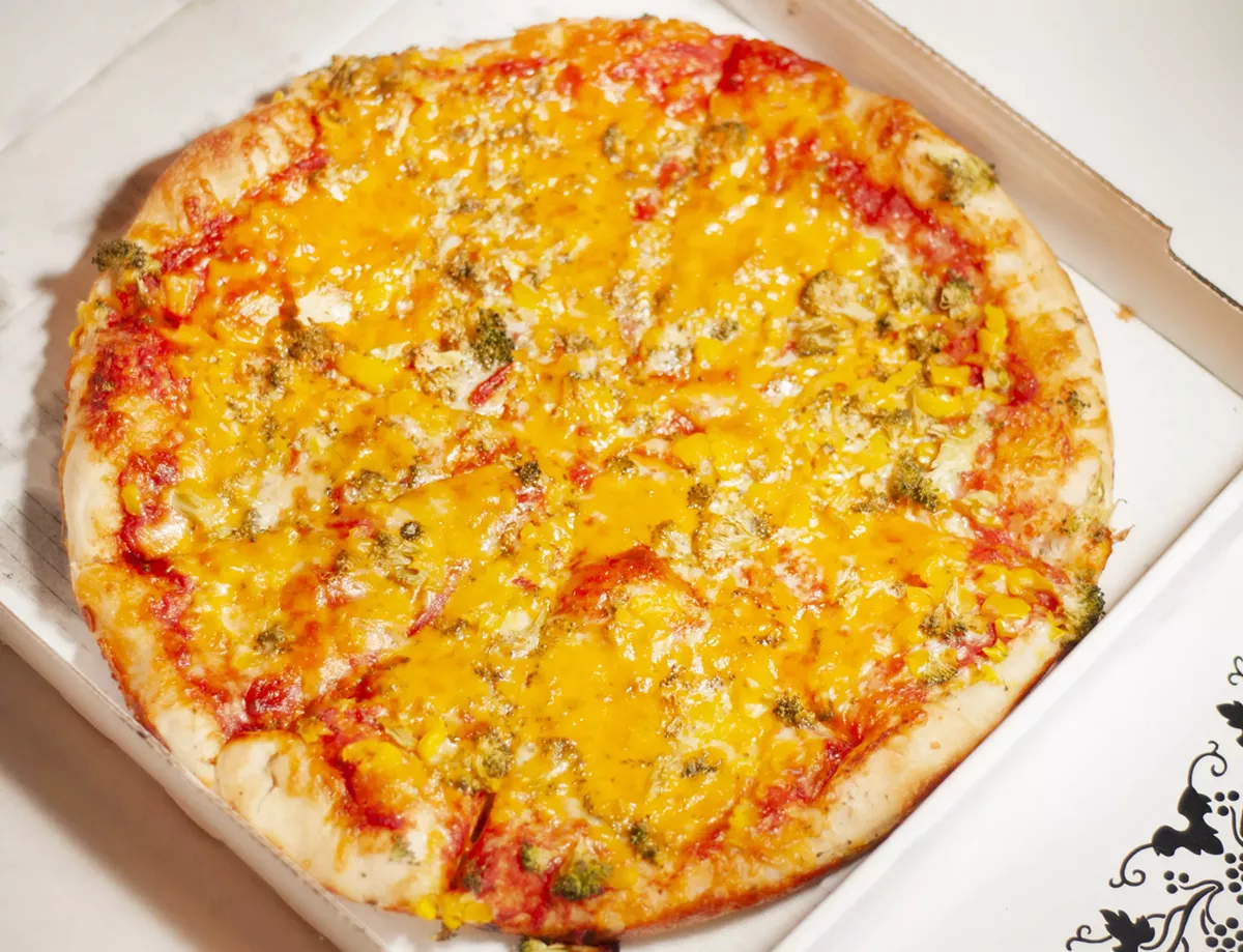 Image: Broccoli, banana peppers, mozzarella, and cheddar.