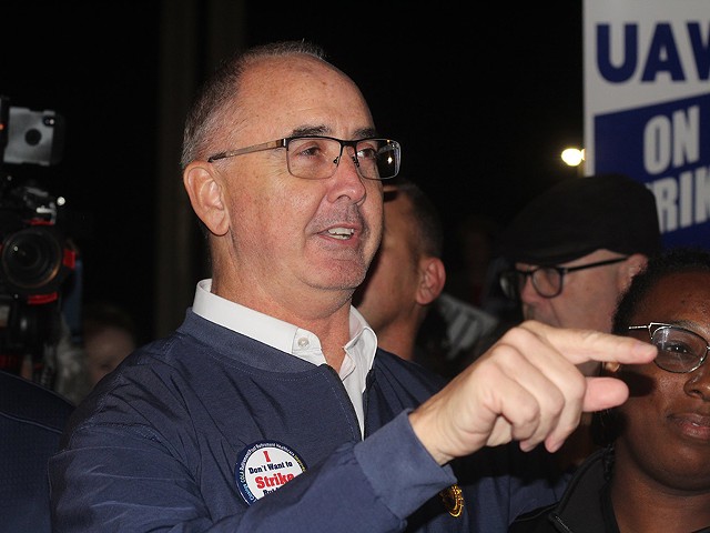 The UAW strike begins and UAW President Shawn Fain talks to picketing workers at Ford-owned Michigan Assembly Plant in Wayne, Michigan the night of September 14, 2023.