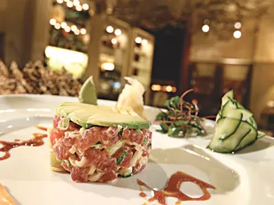 Spicy sashimi-grade tuna tartare with cucumber, scallions, avocado and sesame chips from Wolfgang Puck Grille at the MGM Grand Casino in Detroit.