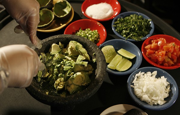 Tableside guacamole from Miguel's Cantina in Rochester Hills. - MT PHOTO: ROB WIDDIS