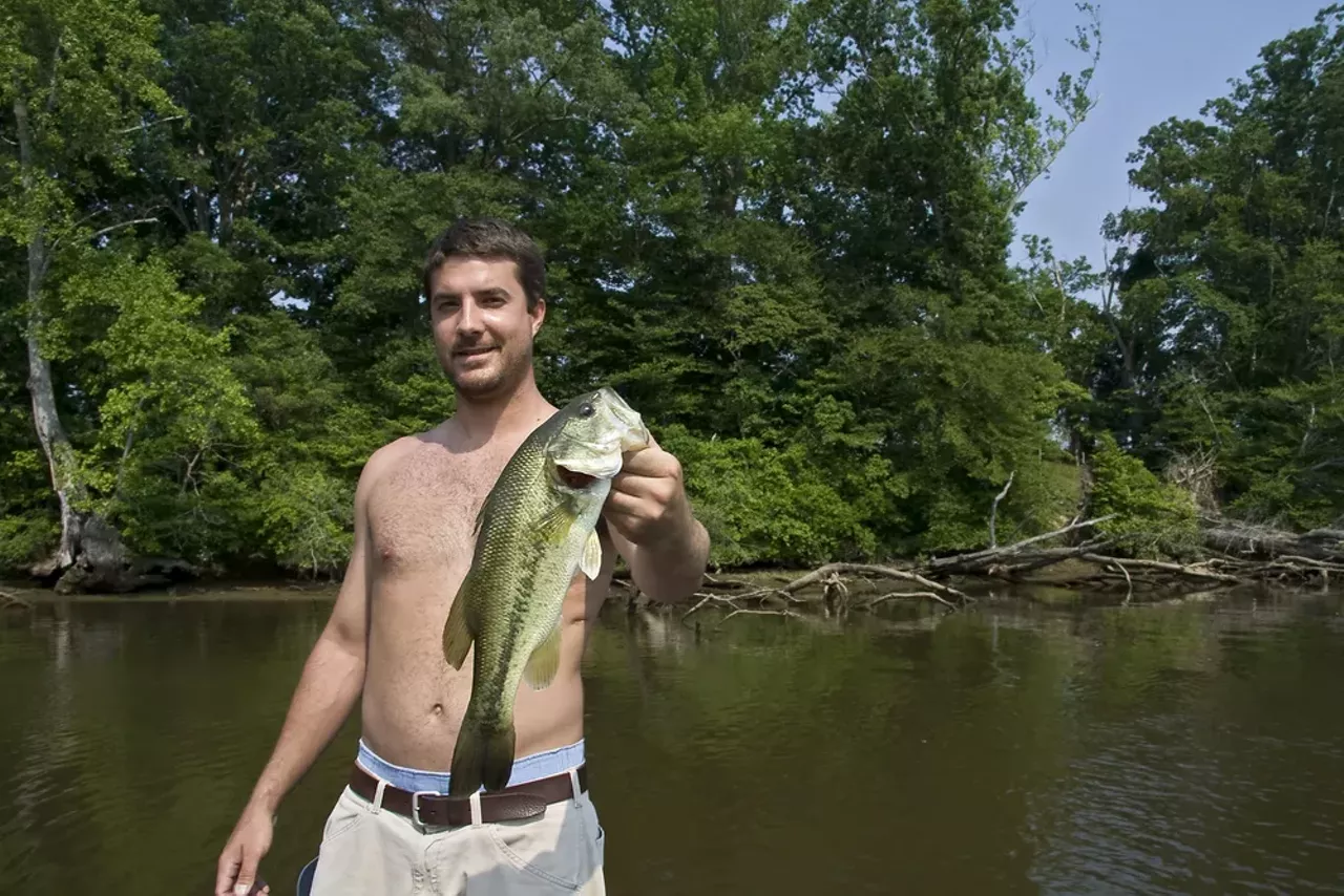 11.) The guy holding his Catch of the Day. Seriously, what is with this?
