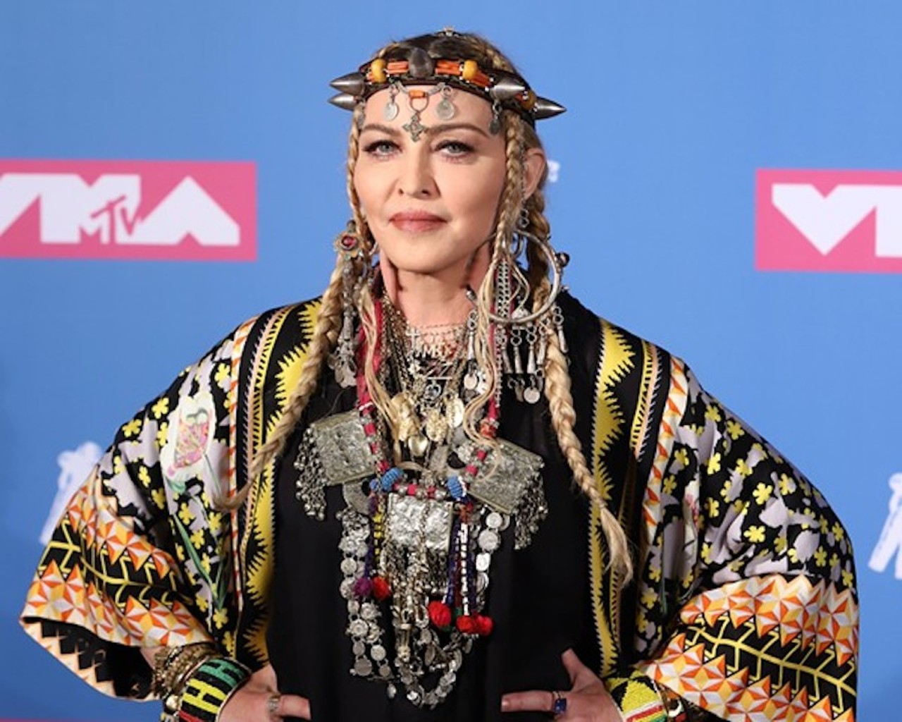 July
Material girl: Provocative pop star Madonna was once again censored &#151; this time for sharing a debunked viral video on her Instagram account. Though Bay City native Madonna could&#146;ve landed herself a Dooby for any number of malfeasance, (like calling COVID-19 &#147;the great equalizer&#148; during a flower-petal bath or having her son David &#147;dance away racism&#148; by dancing to alleged pedophile Michael Jackson's &#147;They Don't Care About Us&#148; to &#147;honor&#148; George Floyd), it was her flagged Instagram post that featured the video of Houston disinformation doctor Stella Immanuel, who claimed that the drug hydroxychloroquine is a proven cure for COVID-19. "They would rather let fear control the people and let the rich get richer and the poor get poorer," Madonna wrote in the video's caption, while also calling Immanuel her "hero." Instagram soon censored Madonna's post, blurring it out and marking it as "false information" flagged by independent fact-checkers. The app also provided a link to a page that debunks the claims in the video. Madonna eventually deleted the post altogether.
Photo via JStone/Shutterstock.com