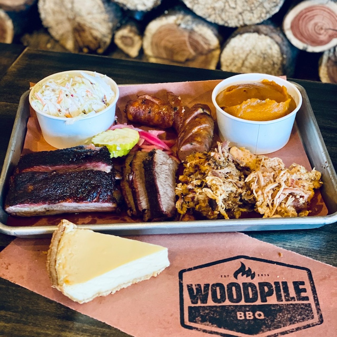 11. Woodpile BBQ 
630 E. 11 Mile Rd., Madison Heights; 248-565-8149;  woodpilebbqshack.com 
"On the first smell, I LOVED at his place. Let's just say it took me a few days to finish the huge meal I bought.  I tried the burnt ends!!! DELICIOUS!! And I think there were pickled onions on the order. Whatever that was has us fighting over it in the parking lot. Needless to say that item never made it home.  I had the platter with the pulled pork, brisket and chicken and ribs and jalapeno cheddar sausage. Lol. Everything was awesome." &#151; Keith D. on Yelp
Photo via  Woodpile BBQ Shack/Facebook</i