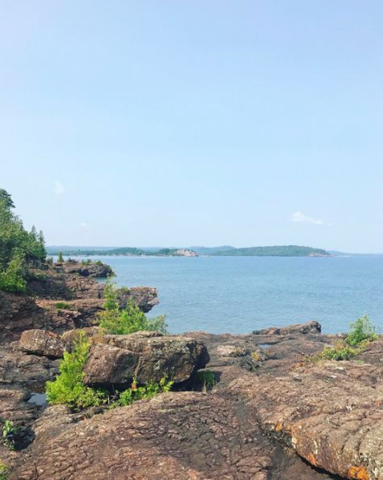 Black Rock Beach
Marquette; 7 hours, 8 minutes
This scenic shoreline is nestled between two cliffs within Presque Isle Park. Take a dive, or admire the beach&#146;s impressive collection of Lake Superior stones. Free for day trips.
Photo via IG user @drusillafish