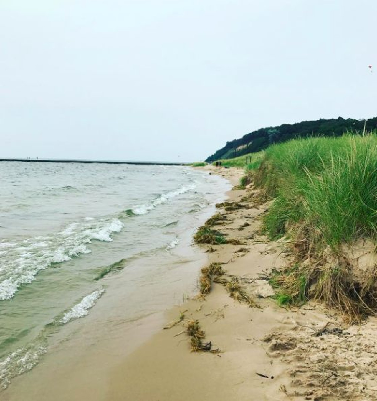 Frankfort Lake Michigan Beach
Frankfort; 4 hours, 2 minutes
Frankfort Beach is known for its views of Sleeping Bear Dunes, quaint atmosphere, and its covetable surrounding houses. Not to mention, it's been called a "sunset haven" by regular visitors. Free.
Photo via IG user @jillian_n_charlie
