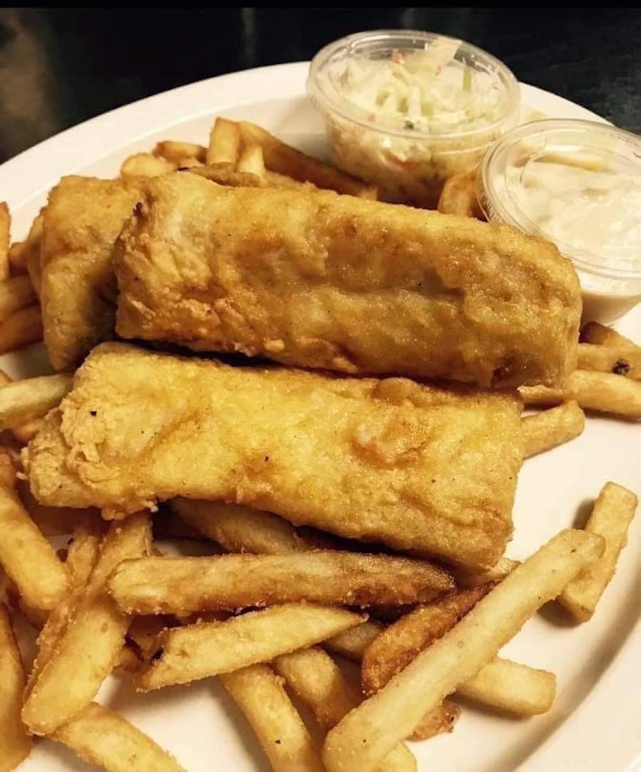 Crow's Nest Bar and Grill
6166 N. Canton Rd., Canton; 734-459-4020; crowsnestcanton.com
All-you-can-eat fish and chips are available every Friday and include cod hand-dipped in a light, beer-batter, served with fries and coleslaw.
Photo via Crow's Nest Bar and Grill/Facebook