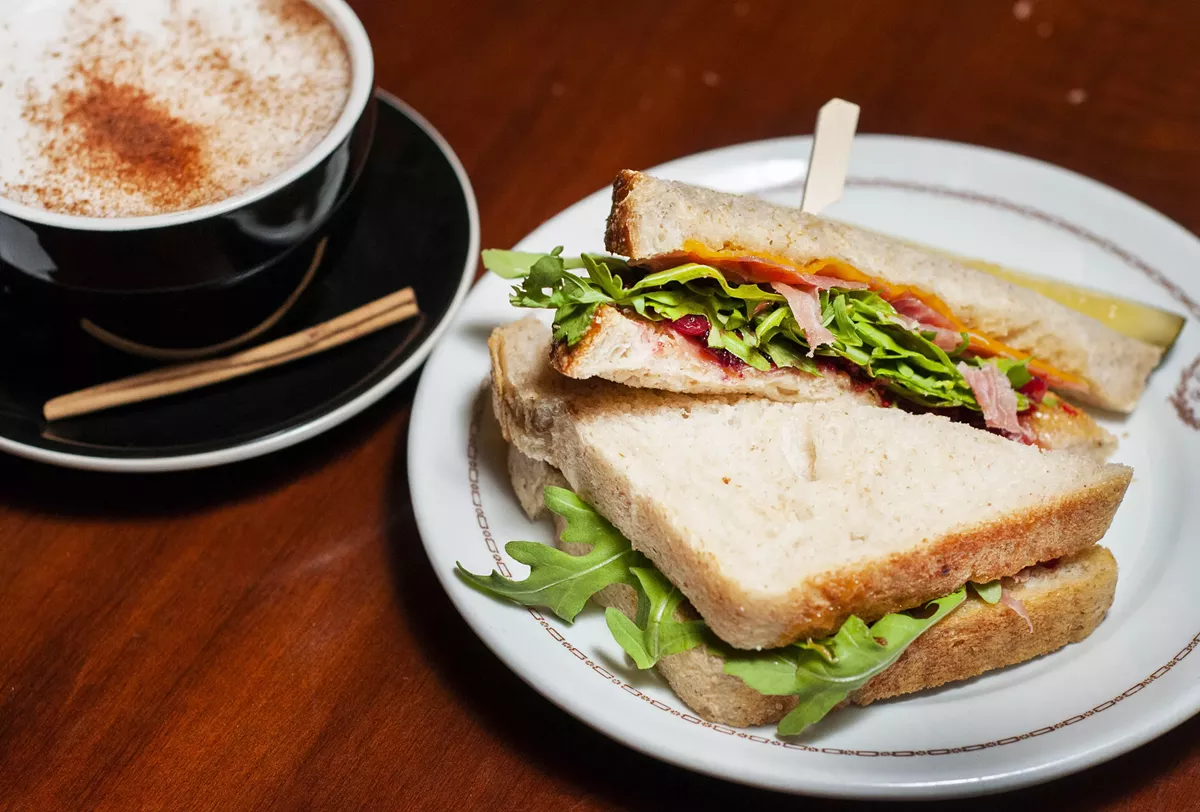 Chai tea latte and prosciutto and apple sandwich from The Congregation.