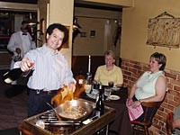 The Cook's Shop: Proprietor Lino Catropa serves spaghetti alla chitarra matriciana (guitar pasta with garlic, bacon, cognac, tomato sauce and Parmesan cheese). - Metro Times Photo / Larry Kaplan