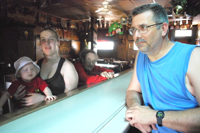 The Dyer family inside their bar. - Photo: Detroitblogger John