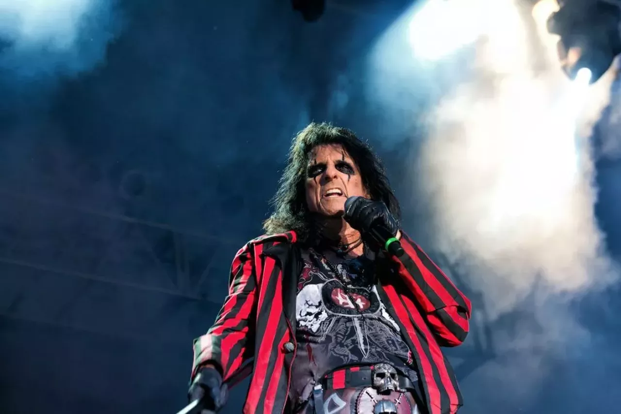 Alice Cooper Alice Cooper&#146;s&nbsp; take on rock &#145;n&#146; roll involves a series of horror film-themed visuals to accompany the hardcore tone of his music. Cooper, born Vincent Furnier, moved from Detroit to Phoenix in the late 1960s in order to pursue his music career, with bandmates Glen Buxton, Michael Bruce, Dennis Dunaway, and Neal Smith (the original band members of Alice Cooper). With a 50-year career, Alice Cooper is still touring the world with supergroup Hollywood Vampires, while also holding the moniker of the Godfather of Shock Rock. Craig Sterken / Photo source