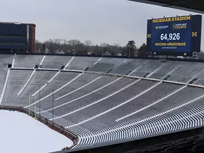 Image: The number of Americans dead from COVID-19 could fill five Michigan Stadiums