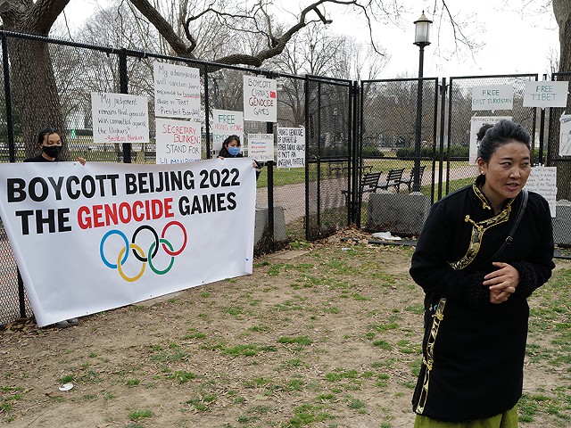 Uyghur activists at the White House protest the continuing genocide against their people in China asking the Biden administration to boycott the 2022 Olympic Games.