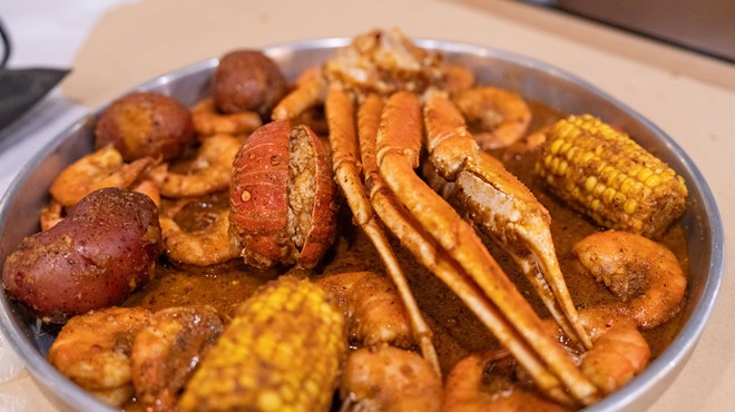 The Red Sea Platter includes snow crab, shrimp, mussels, corn, redskins, and rice.