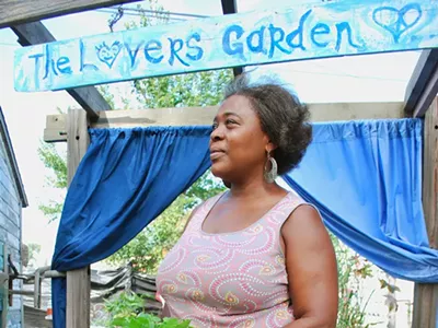 Tamra Meadows in her herb-filled garden
