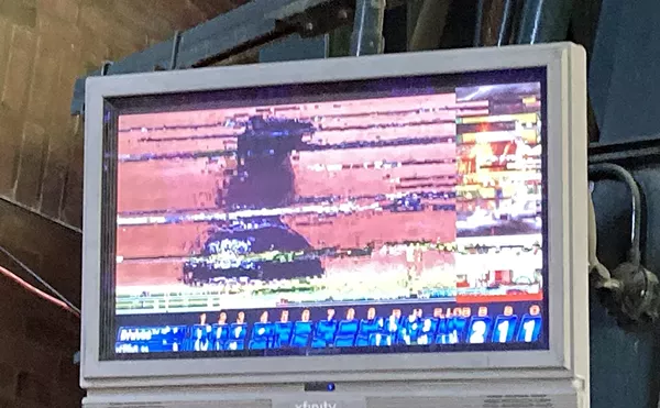 Some of the TV monitors at Comerica Park show freeze frames filled with static.