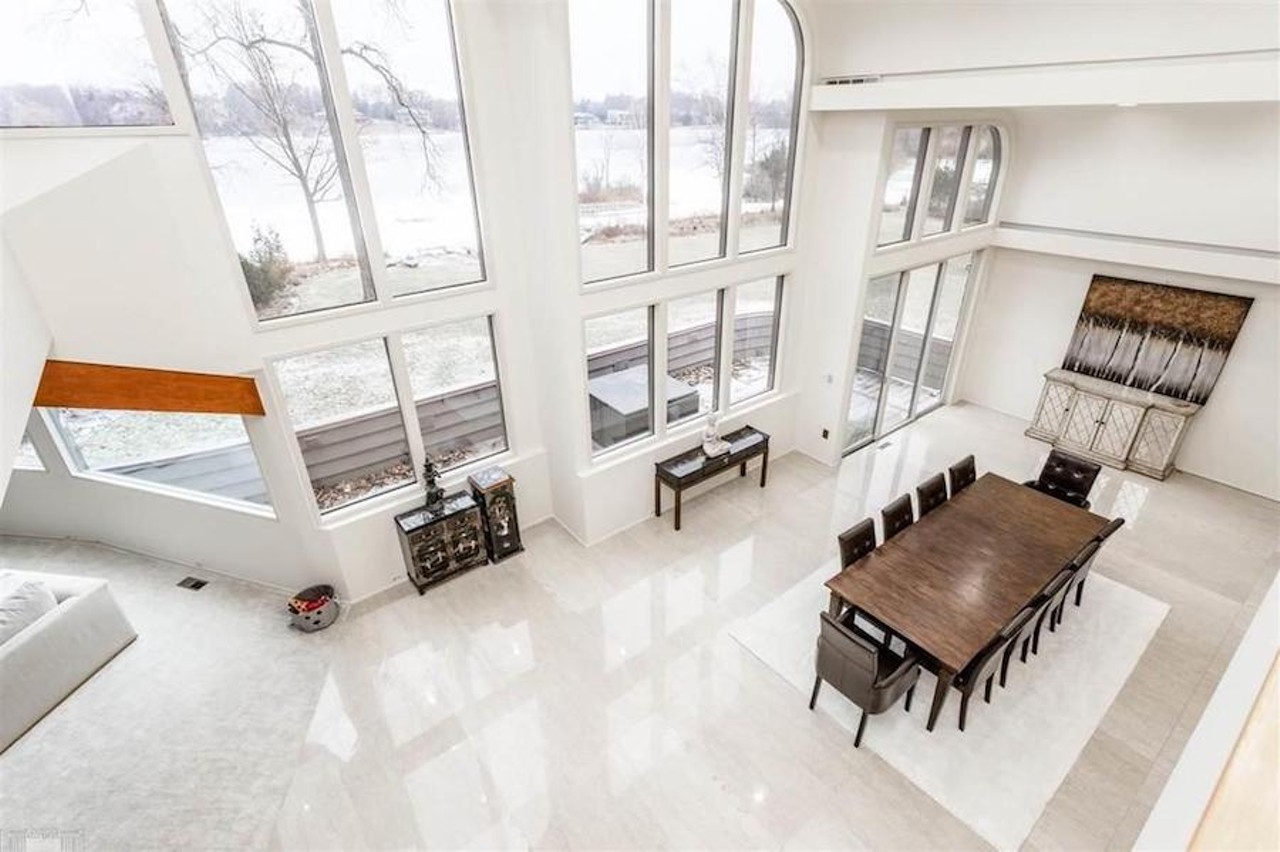 This $1.37 million retro waterfront home in Bloomfield Township has a solarium with a hot tub