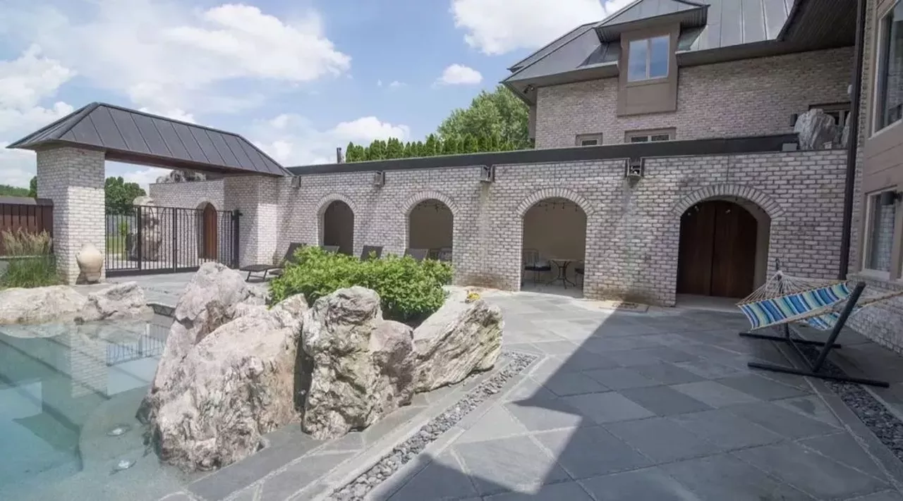 Image: This $1.79 million Ann Arbor mansion has a lagoon fit for a tiger king or queen &#151; let's take a look