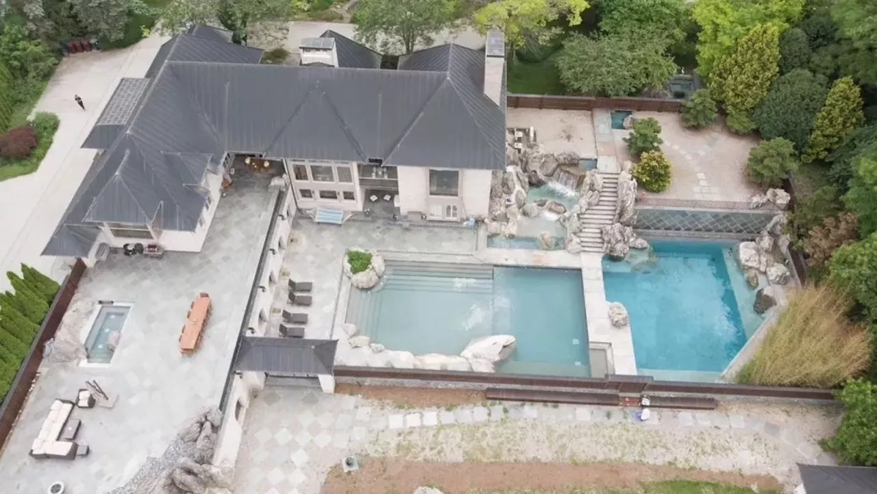 Image: This $1.79 million Ann Arbor mansion has a lagoon fit for a tiger king or queen &#151; let's take a look