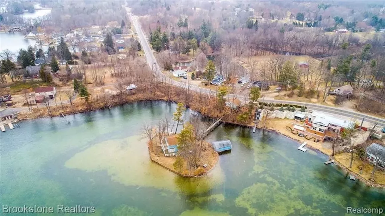 Image: This $460k island house in Leonard has a bridge and Brady Bunch-style kitchen