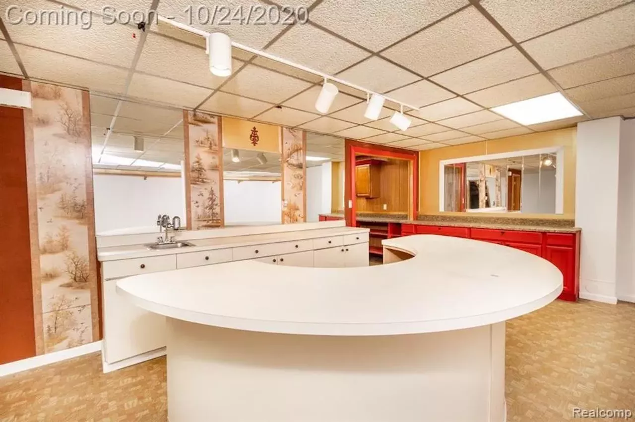 Image: This $550k metro Detroit home designed by the Palace architects has an indoor koi pond