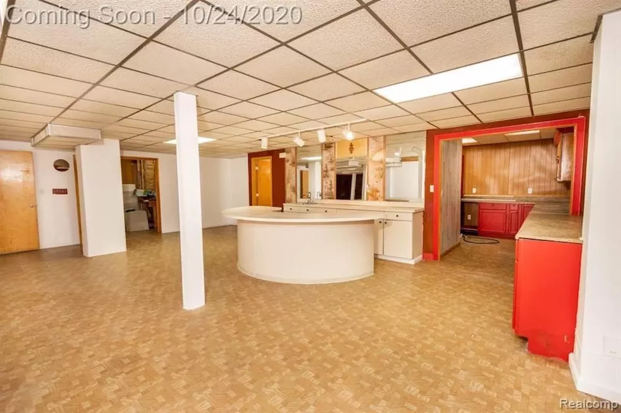 Image: This $550k metro Detroit home designed by the Palace architects has an indoor koi pond
